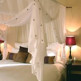 Suspended mosquito net